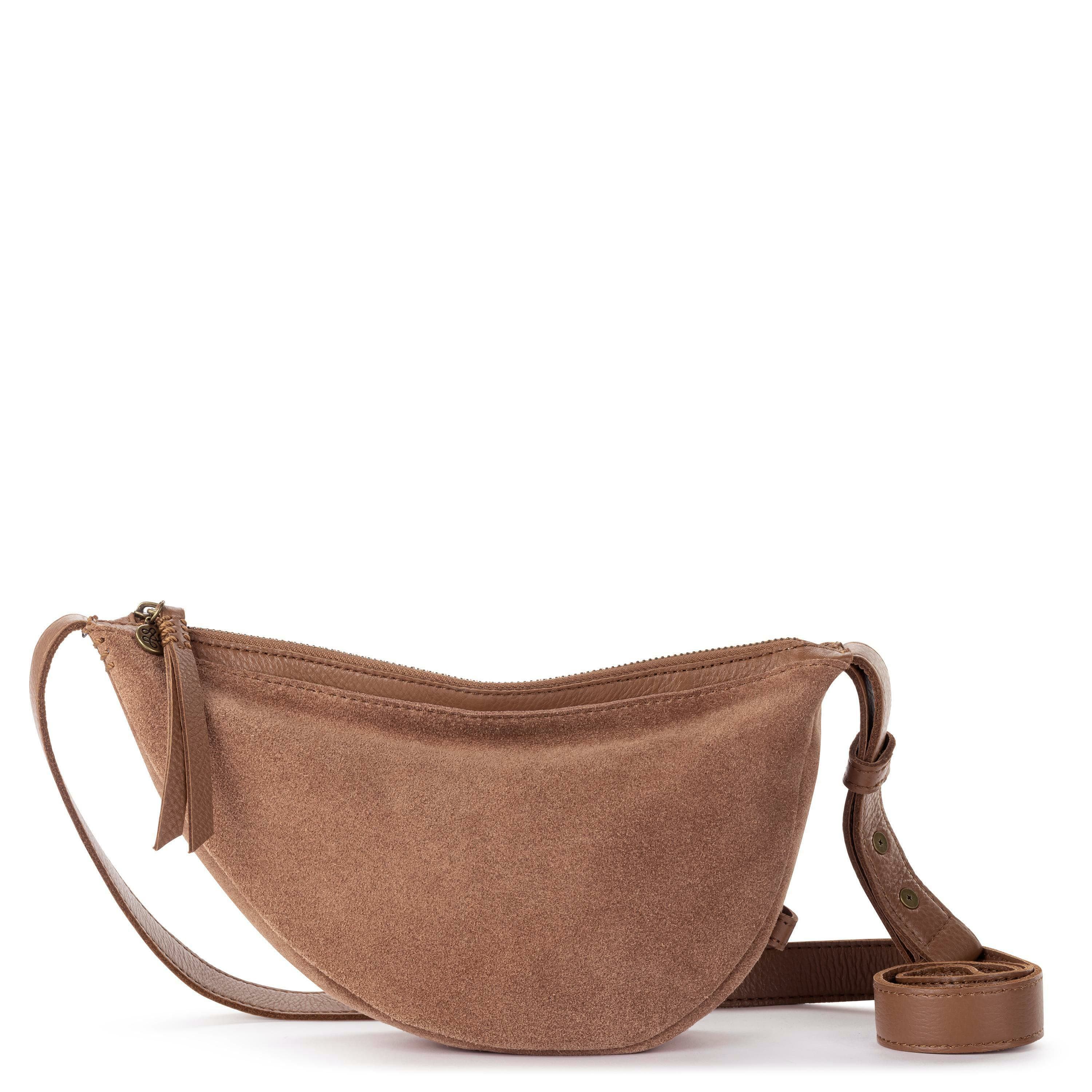 the sak tobacco Melrose Satchel - Leather the strap features three loops to clip a pouch Cypress Tassel Dangle in Tobacco