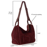 Black cherry suede hobo bag with dual handles and top zipper closure.
